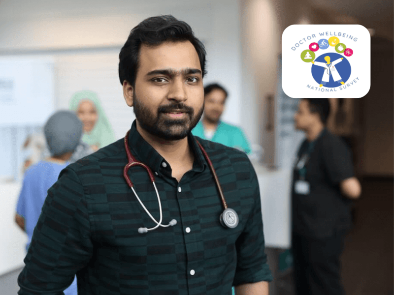 Doctor with other doctors in foreground in hospital setting